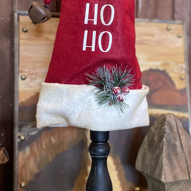 Felt santa hat stand is 19 inches tall and would be adorable anywhere in your home this holiday season