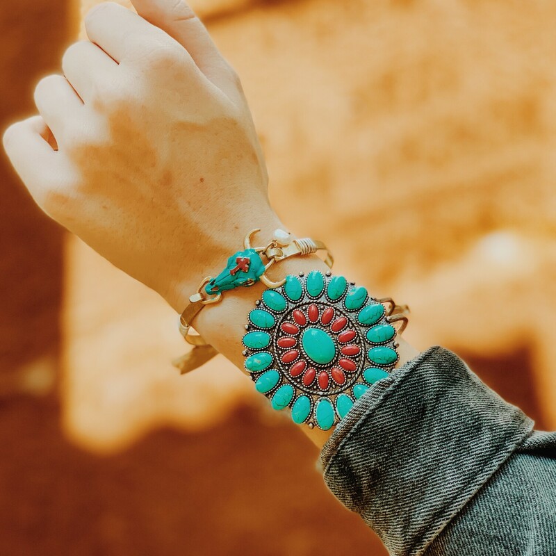 Boho turquoise cow skull with a red cross! Gold bangle with silver accents!
