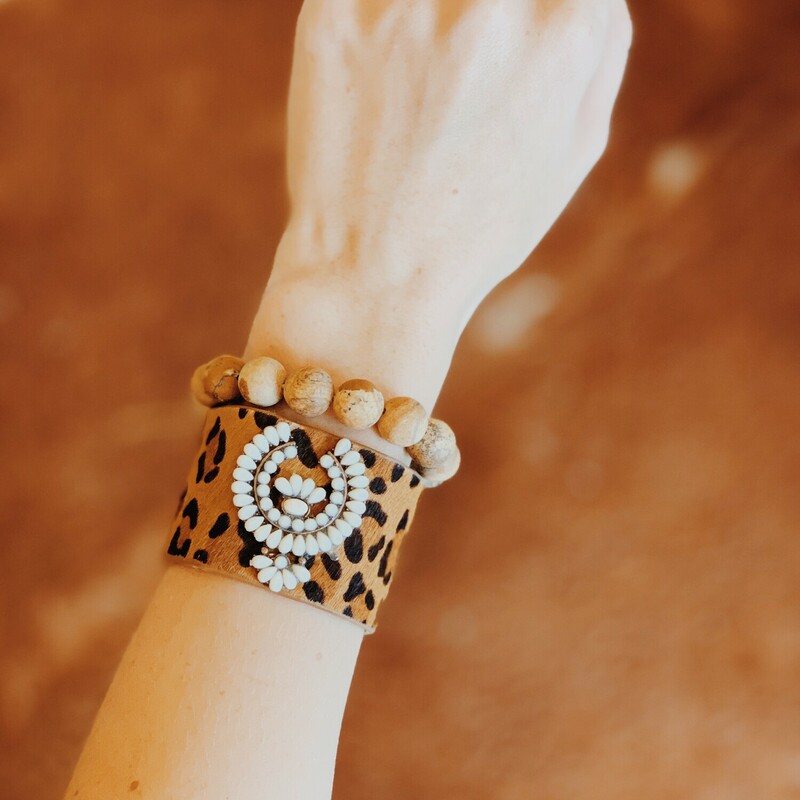 Leopard cuff with cream colored stones! Adjustable from 6.5 to 7 inches.