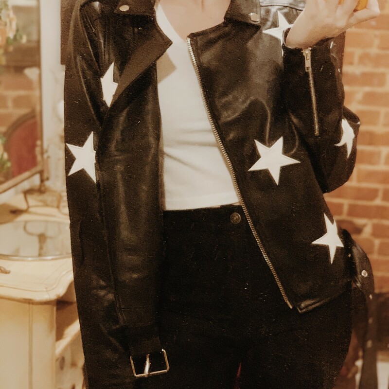 This faux leather moto jacket with white stars is so fun and unique! Perfect to pair with jeans and go!