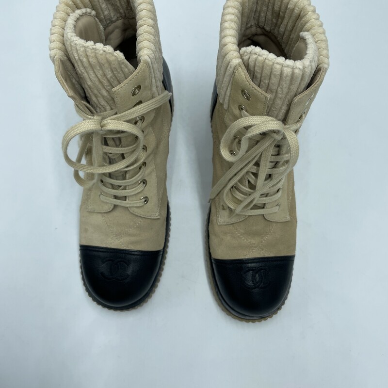 Chanel Quilted Combat Boots<br />
Color:  Tan, Black<br />
Size: 39<br />
Conditon: small spot near bottom lace