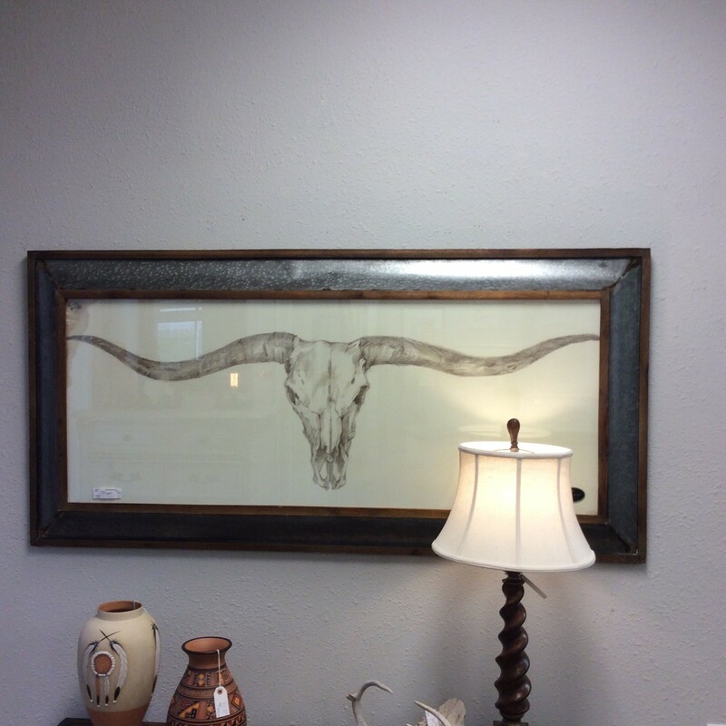 By Uttermost, this longhorn has been beautifully framed.