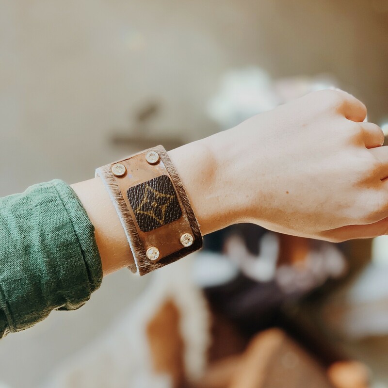 This upcycled, hand-made bracelet was made from an authentic Louis Vuitton bag! The bag's date code is SP0927.<br />
<br />
Not affiliated with the LV company.