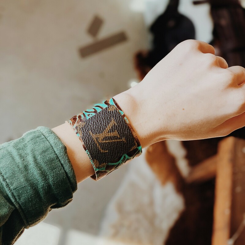 This upcycled, hand-made bracelet was made from an authentic Louis Vuitton bag! The bag's date code is SP0927.<br />
<br />
Not affiliated with the LV company.