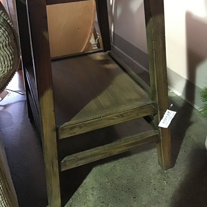 Nice size wooden side table that features a lower shelf to hold books or magazines or a cat.

Dimensions: 18x22x25