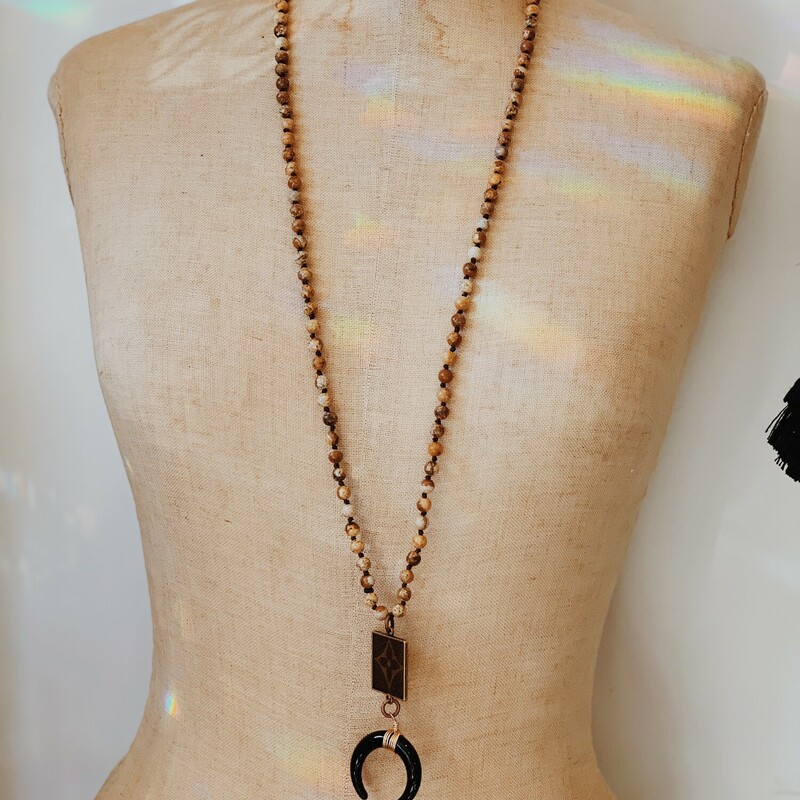 This upcycled, hand-made necklace was made from an authentic Louis Vuitton bag! The bag's date code is SP0927. See pictures for measurements.<br />
<br />
Not affiliated with the LV company.