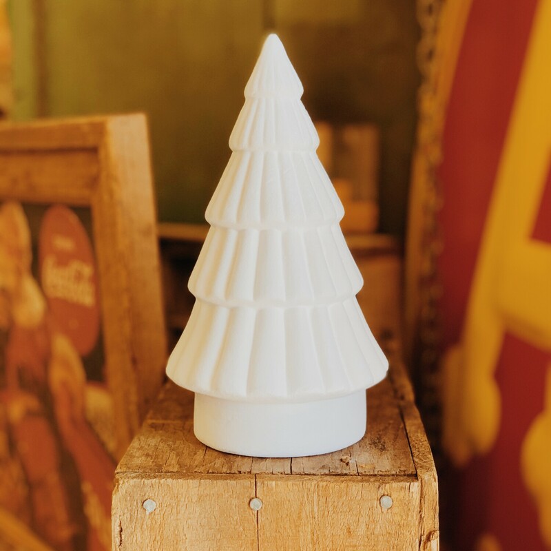 These lovely Christmas trees are available in a green or white style. The green measures 8.5 inches tall, and the white measures 8 inches tall. They are made of ceramic and covered in a beautiful velvet-like material! Perfect for all of your Christmas decorating needs!