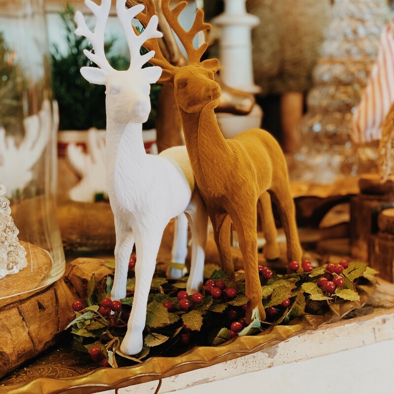 These beautiful reindeer measure 13 inches from their hooves to the top of their antlers! They are the perfect touch to your Christmas decor! They are available in a white color or a camel color.