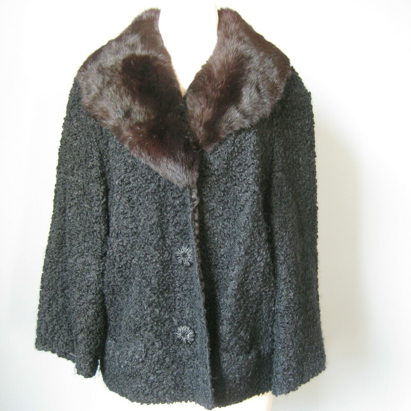 Vtg Wagenheim Pers. Lamb, Black, Size: Large
This is a short faux persian lamb jacket with a fur collar.
The body is black and the collar is a dark brown genuine mink
Fully lined in satin, with the former owners initial embroidered inside.
Purchased at a venerated fur salon in Amsterdam NY in the 1950s or 60s
flat measurements taken on the inside:
armpit to armpit 24
Length: 24.75

Thanks for looking!
#42342