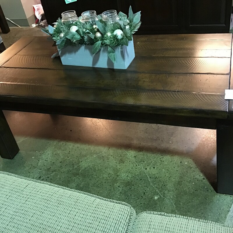 Thi Pottery Barn Hyde Collection Coffee Table honors the strength and simplicity of rustic-industrial design. This rectangular coffee table features a hand-applied finish that highlights each intentional saw mark and groove across the wood’s naturally occurring grain.

Dimensions:  51W x 24D x 18H
