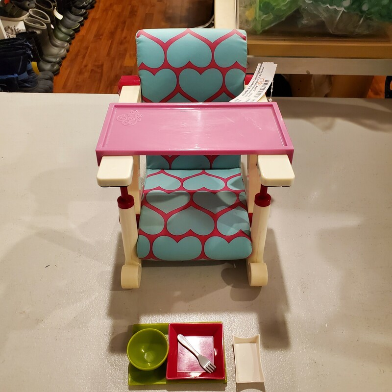 Our Generation High Chair
comes with accessories in picture
sold as is