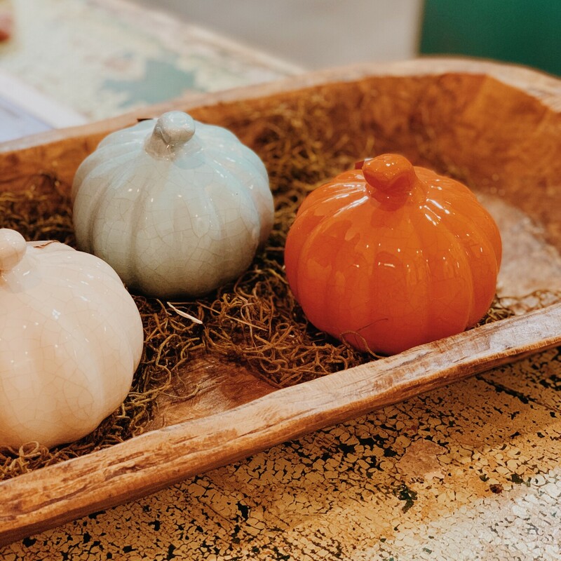 These beautiful ceramic pumpkins measure 4 inches in diameter. They are available in cream, turquoise, and orange!