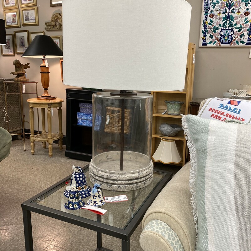 Ethan Allen Sansovino Lamp, None, Size: 30 Inch
Sansovino blends the delicate and the sturdy, the rough and the refined, in a rugged industrial-chic design. Its combination of a weathered, textured concrete/resin blend and ethereal glass is a dynamic duo that's top-notch in trios.
Made of glass and resin
Clear glass with a distressed resin base
Beige linen hardback shade
100 watt, three-way switch
UL listed