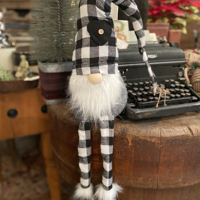 Who doesn't love a cute Gnome to add a touch of whimsy to their home?  This buffalo check Gnome is 18 inches tall and can sit anywhere you'd like, complete with his dangle legs he will add some fun to your home this season