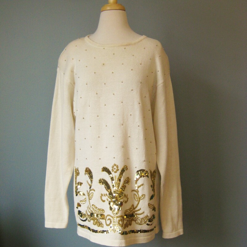 Gorgeous vintage Christmas sweater in slightly unexpected off white and gold.
Lavishly decorated with shiny gold sequins at the bottom edge.
Shoulder pads
55% Ramie and 45% cotton
Marked size Large

Flat Measurements
Armpit to Armpit: 21
Shoulder to shoulder: 21
Underarm sleeve seam length: 19.5
Width at hem : 20
Length from back neck to hem: 30

good vintage condition with a very slight shadow at the neckline on the left.
thanks for looking!

#43171