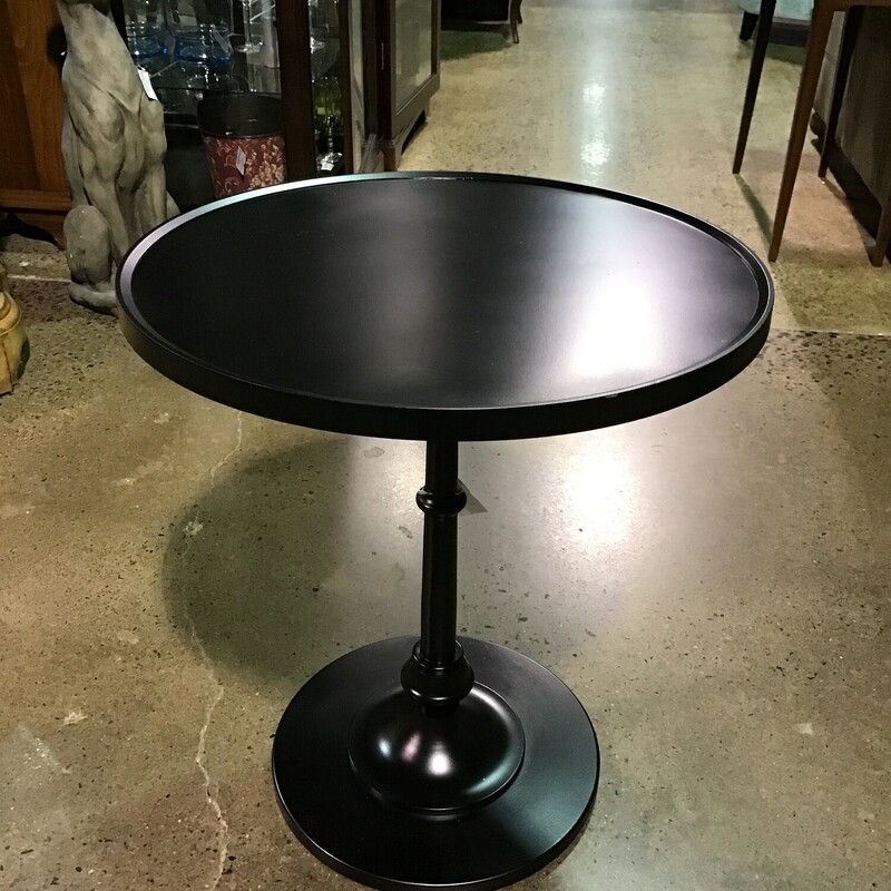 This black round metal accent table would be perfect in between 2 chairs, next to a sofa or as a bedside table. It is painted black and in excellent condition!
Dimensions are 22 in x 24 in