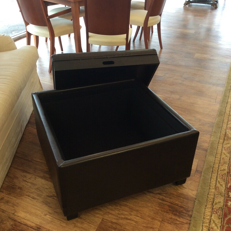 This is a perfect combination of beauty and function. The top of the large squared ottoman is removed to provide a ton of storage space. Flip the top over and it becomes a tray. What's not to love about this? Come by soon and take a look while it's here!