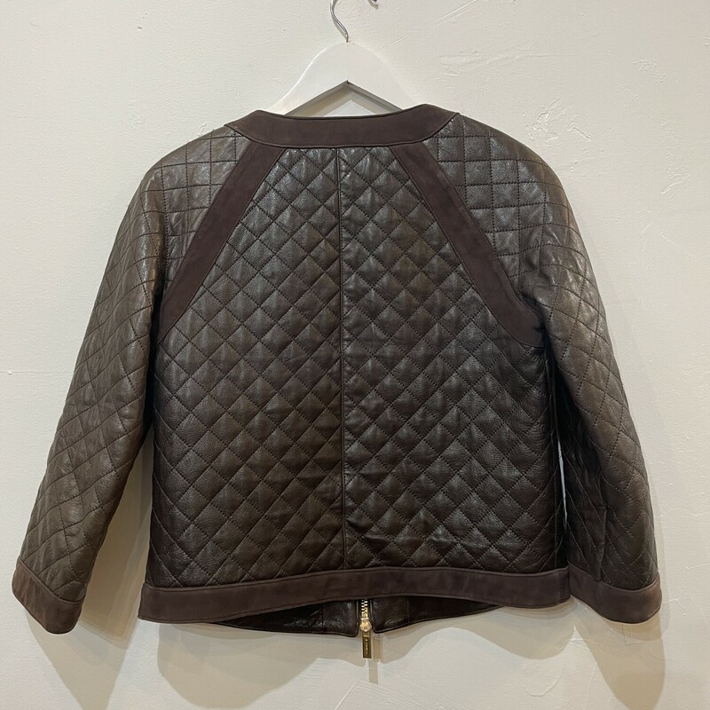 Tory Burch Quilted Leather Jacket
Color: Brown, Gold
Size: 6
100% Leather