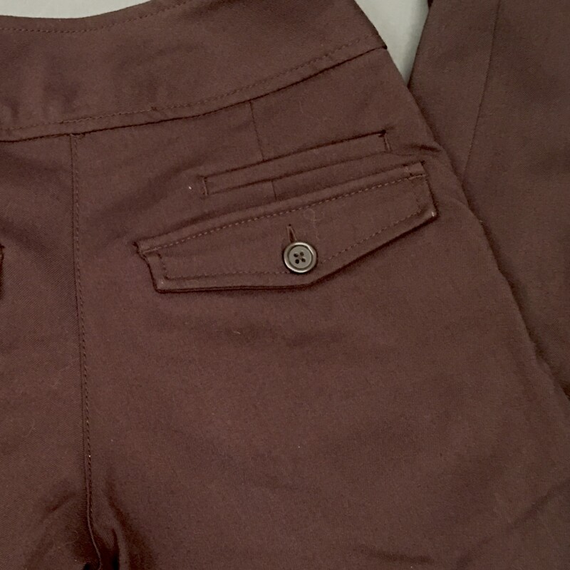 H&M US size 4, dark brown dress pants, wide waist band with 2 button closure, 3 back pockets