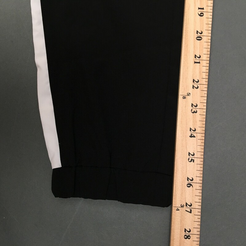 12%spandex,88%polyester, Black, Size: Petite, red and white striped knit waist band with drawstring, front zip pockets, white fabric panel on legs. Calvin Klein Performance new with tags