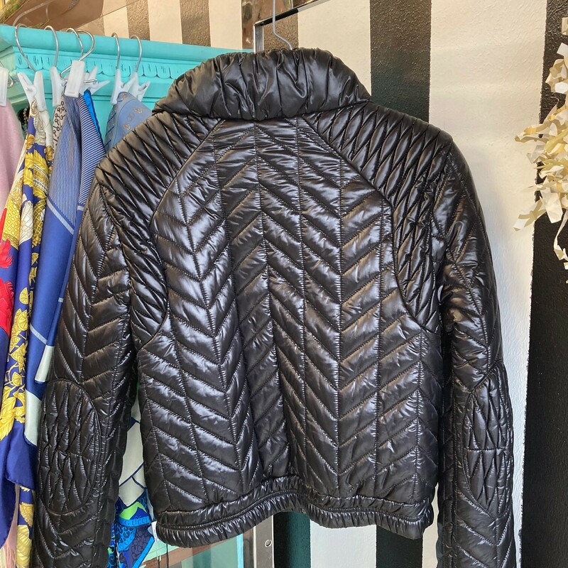 Prada Puffer Jacket: This is a must have moving into a fresh year.  Stay cozy and stylish this winter.
