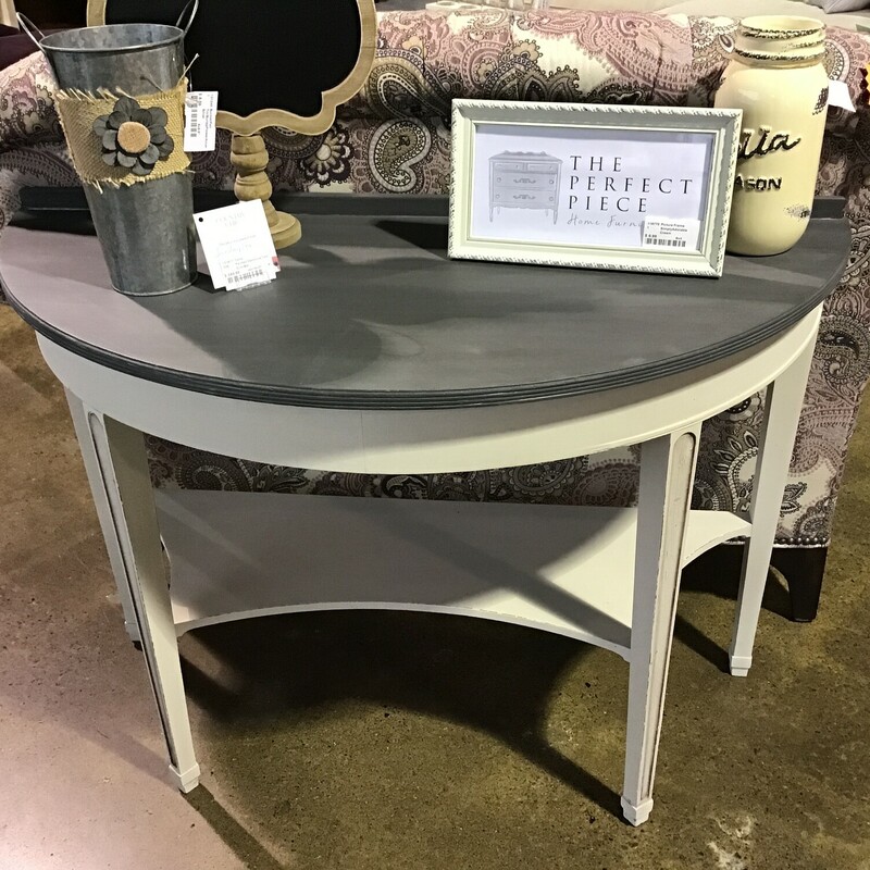 This updated table was painted by one of our local artists using Country Chics Sunday Tea and Liquorice paints and Waverly Paint Truffle. It is black on the top and cream on the base. Beautiful wall table or sofa table!
Dimensions are 40 in x 18 in x 27 in