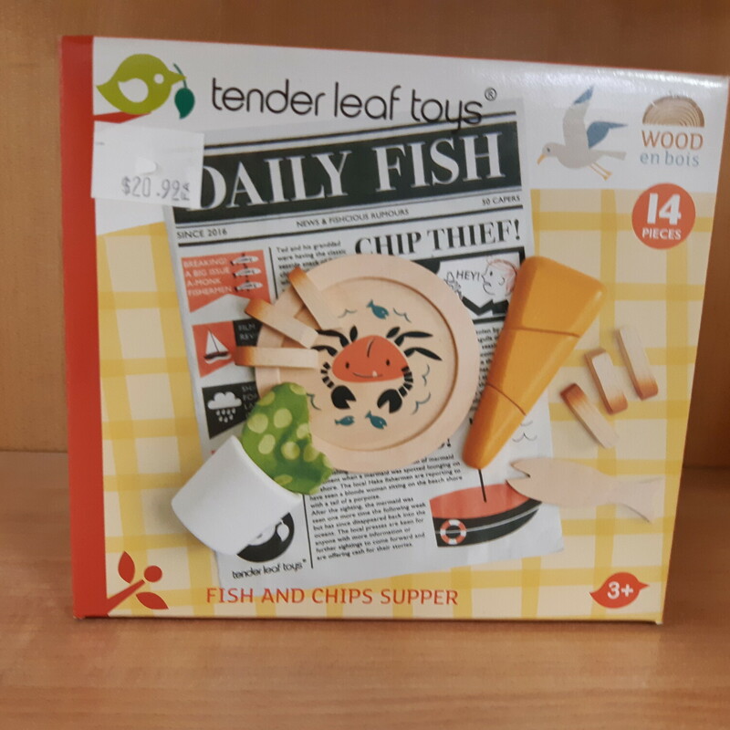 A traditional seaside supper. Fish and chips, and mushy peas! A plate illustrated with a crab, a fork, tactile mushy peas in a cup, all wrapped up in the Daily Fish newspaper!