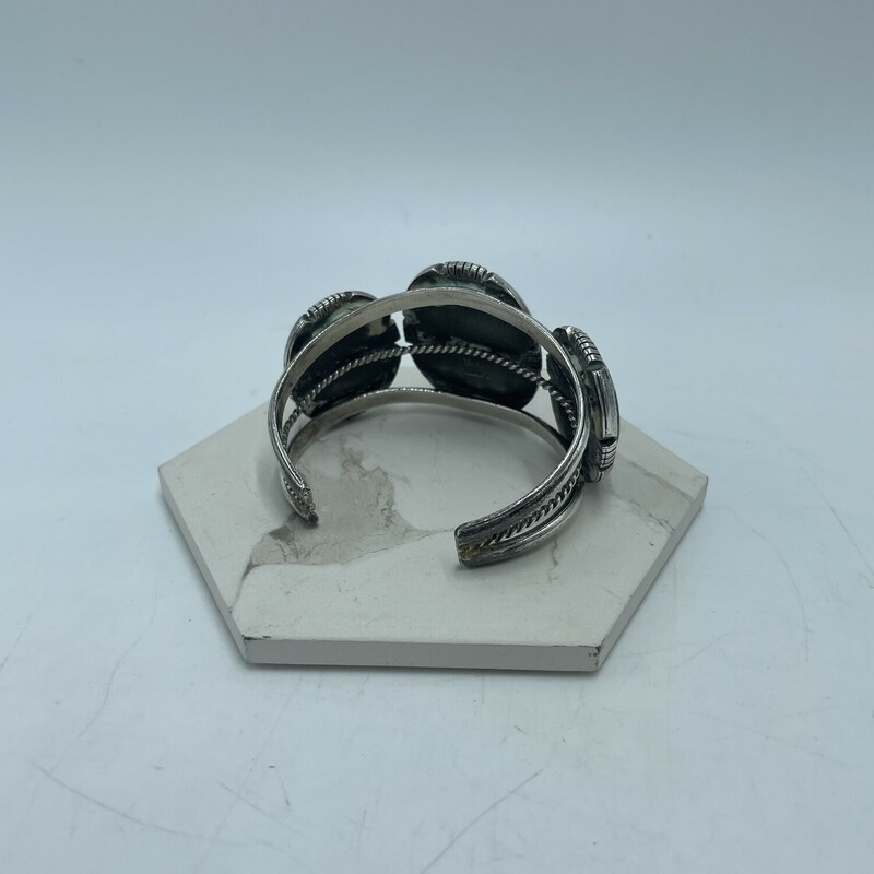 Neal Paquin Cuff

marked sterling + NP (artist mark)
best guess is Neal Paquin, Jemez jewelry artist