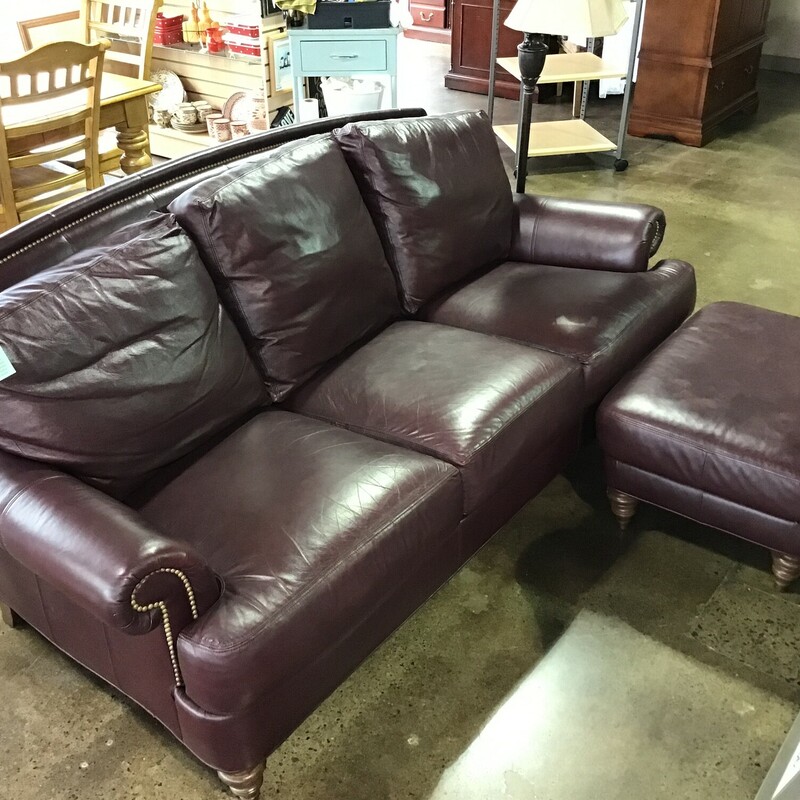 This super comfortable leather sofa from Ethan Allen is upholstered in a gorgeous merlot leather. It features 3 back and seat cushions that are flippable, nailhead trim and a camelback. There is a matching ottoman for this sofa which is sold with the sofa. Great piece for your family room, game room, den or office space!
Sofa Dimensions are 88 in x 38 in x 37 in
Ottoman Dimensions are 34 in x 24 in x 17 in