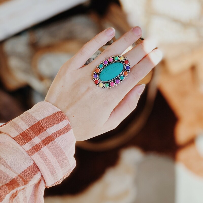 These beautiful rings have a one size fits all, adjustable band. Available in Multicolored or Blue/Red.