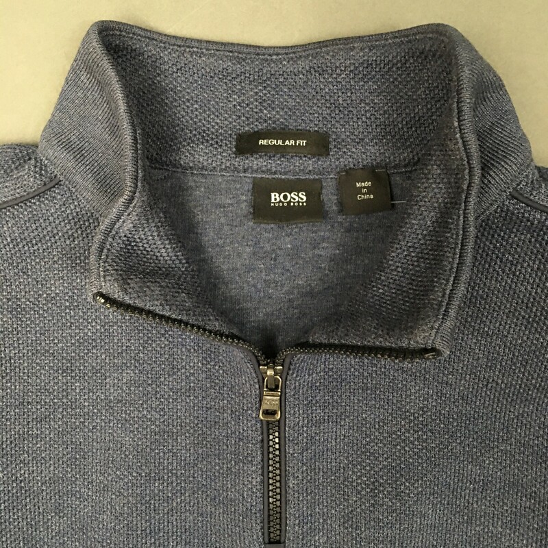 1/2 black Zip Jumper Reg Fit, Size: M Navy
 kint cotton sweatshirt, Ribbed stand collar
Long sleeves
Ribbed cuffs and hem
Logo metal  tag near the hem
fabric tag removed, Hugo Boss tag on collar, no logo