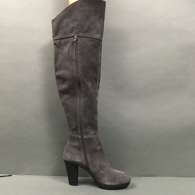 Nine West Nwaloysa Suede, Dk Grey, Size: 7M<br />
These are worn once over the knee dark grey suede boots.The tops can be folded down for a second look. There is a very small stiching open in front of boot seam  as seen in the photo, otherwise in very nice condition  Heels are very gently worn.<br />
Shaft to Knee 17.5 inch with additional 5inch  flap that can fold over.<br />
Solid 3.5 inch heel<br />
Inside side zipper 17.5 inch<br />
<br />
Leather upper  balance man made in China.