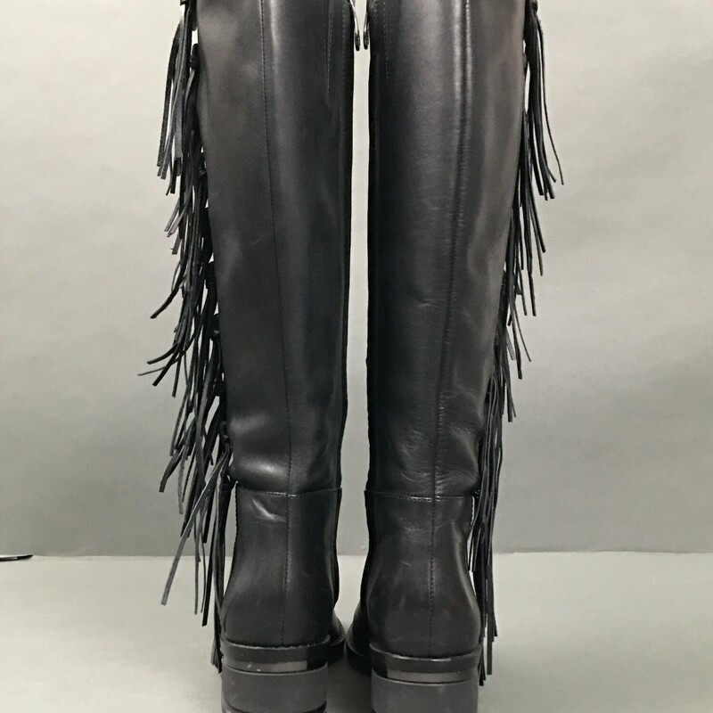 Carolina Espinosa Darrell Leather Knee High Boots, Black, Size: 7 Cedarell Leather, 10 knotted black fringe on outside of boot. 1.5 \" Heel has gunmetal wrap. Rubber tread sole on leather. Shaft to knee 15.5 inch, inside full zipper 15.5 inch. These are like new great condition all around. There is a little scratch on metal detail of one heel seen in photo