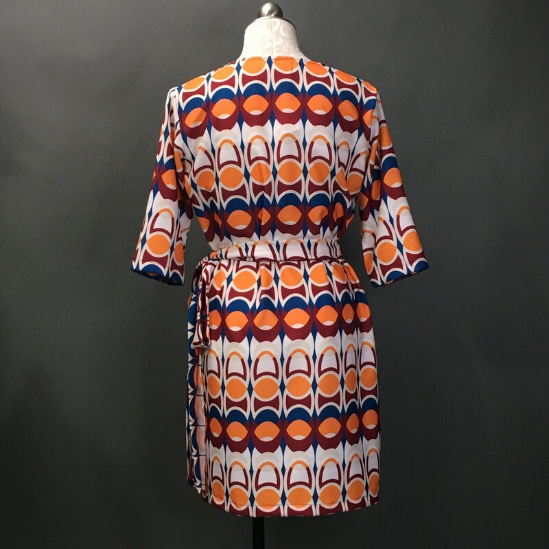 Laura Estrada, Pattern, Size:S/ M. Laura Estrada, Pattern, Size: M 3/4 sleeve,55% polyester / 45% rayon geometric print  tangerine, brick red, yale blue, and white. This is a light pull over, cute V neck wrap and tie at the side of the waist, unlined dress. This dress falls just over the knees, and is a probable fit for size 6 to 8. Please see the measurements. There are no material tags. Columbian designer Laura Estrada is exclusive to L'Unique Boutique in CT. This dress is one of a kind!
8.4 oz