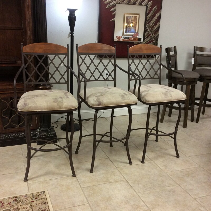 Furnish your bar area or casual living room with these contemporary wood and metal barstools. By Minson Corporation, they have an upholstered seat and they swivel.