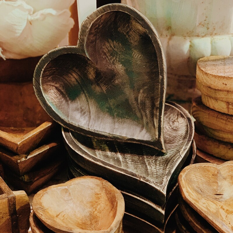 These lovely wooden dough bowls are stained black and uniquely shaped like hearts! They measure 11 inches tall by 10 inches wide.