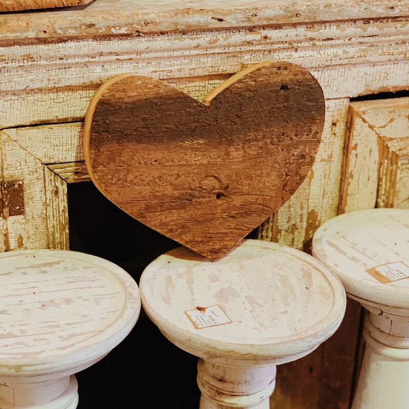 These wooden hearts are adorable for Valentines Day! They are the perfect finishing touch to your holiday decor! They measure 9.5 inches wide by 8 inches tall.