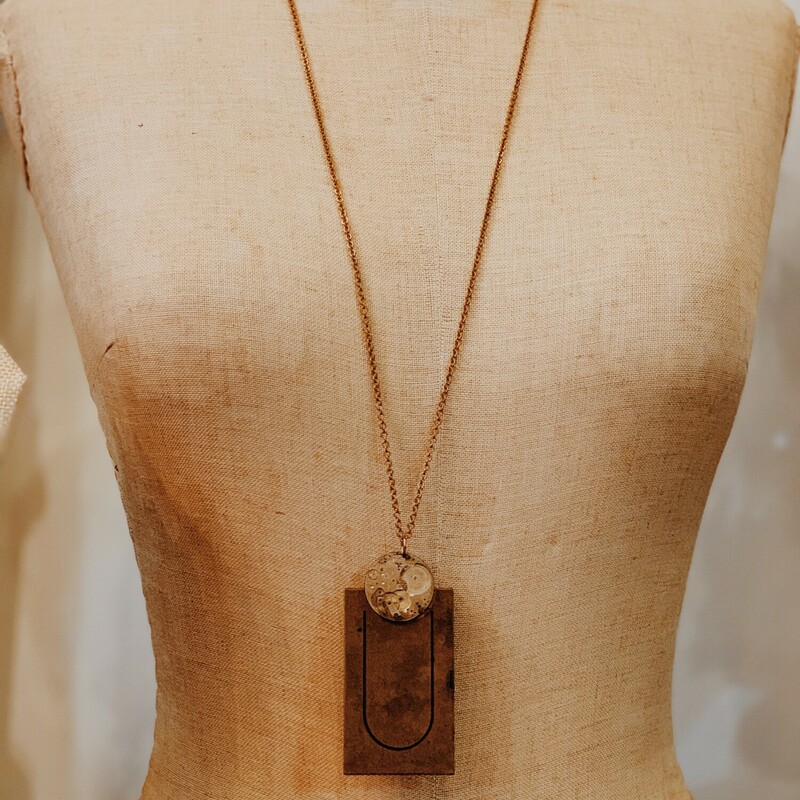 This lovely, handmade necklace is truly one of a kind! It was elegantly crafted and has a U initialed brass plate. It is on a 32 inch chain.