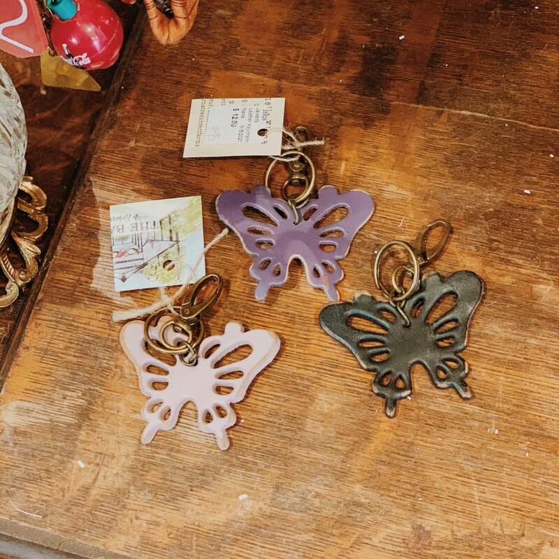These adorable butterfly keychains are made of genuine leather! They are such a cute addition to a key ring! They are available in Light Purple, Dark Purple, and Black.