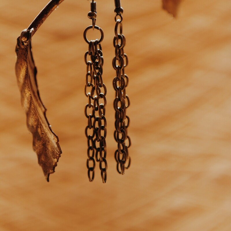These adorable fringe chain earrings measure 2.75 inches long!