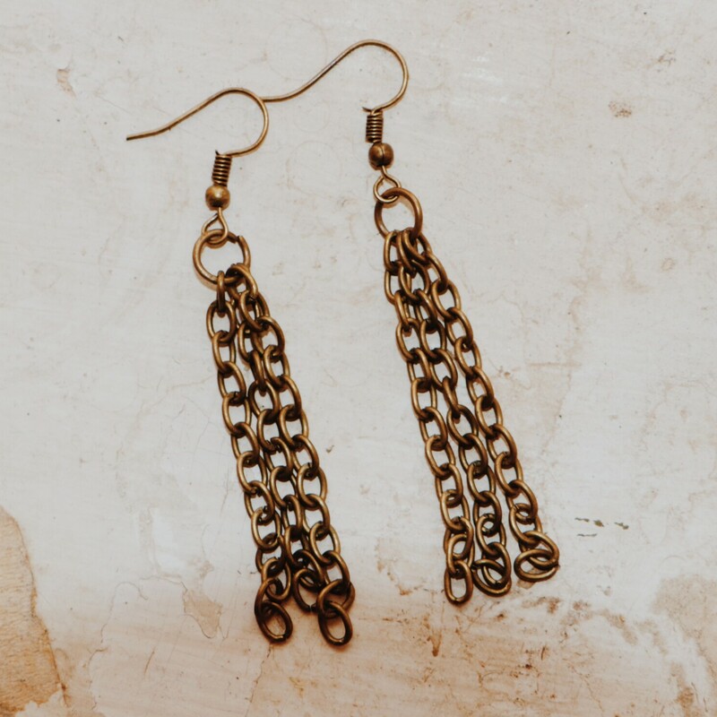 These adorable fringe chain earrings measure 2.75 inches long!