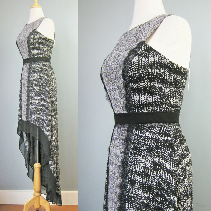BDBGMaxazria Hi Low, B/W, Size: 4<br />
Brand new dress from BCBGMaxazria<br />
black and white hi low summer gown with lace trim<br />
sleeveless<br />
The center panel has a snake print and is bordered by the black lace, the sides are a different black and white abstract pattern.<br />
Long in the back shorter in the front.<br />
Size 4<br />
NWT - Org. $398<br />
<br />
flat measurements:<br />
armpit to armpit: 16.75<br />
waist: 13.5<br />
hip: 18.5<br />
length: 62 in the back, 36.5 in the front.<br />
<br />
100% poly<br />
thanks for looking!<br />
#37688