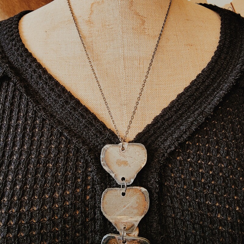 These adorable heart shaped necklaces are available in two chain lengths: 22 inch or 26 inch