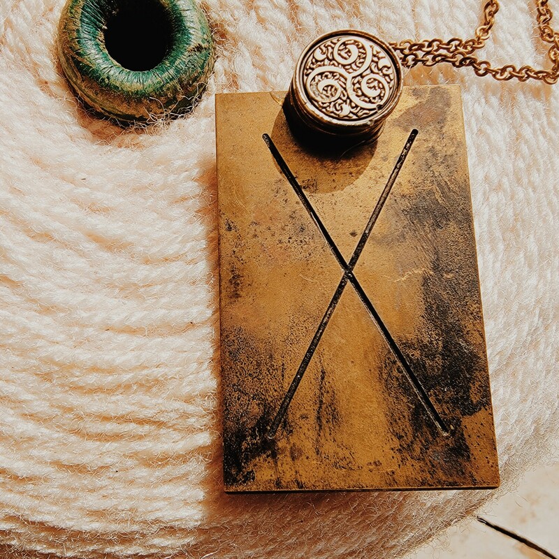 - Hand crafted necklace<br />
- 32 Inch chain<br />
- X engraved brass plate
