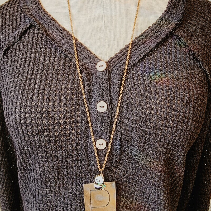 - Hand crafted necklace
- 32 inch chain
- P engraved brass plate
- Panda charm connector