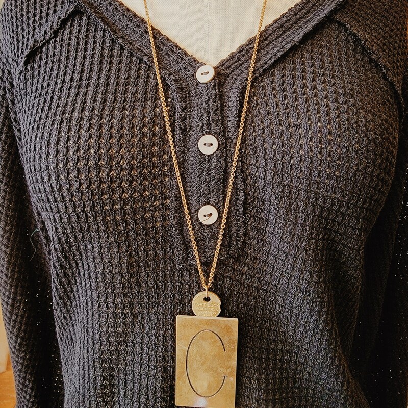 - Hand crafted necklaces
- 33 inch chain
- C engraved brass plate
- Antique key used as connector