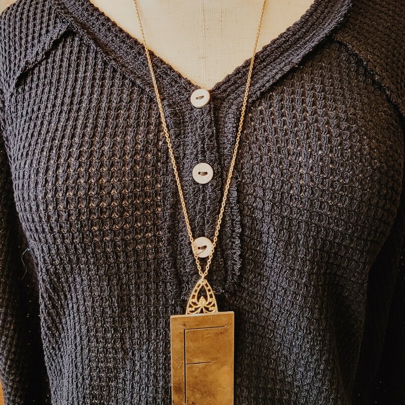 - Hand crafted necklace
- 32 inch chain
- F engraved brass plate