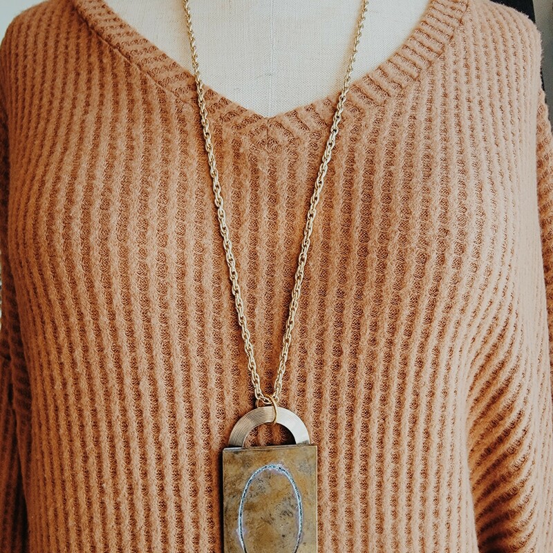 - Hand crafted necklace
- 32 Inch chain
- 0 engraved brass plate