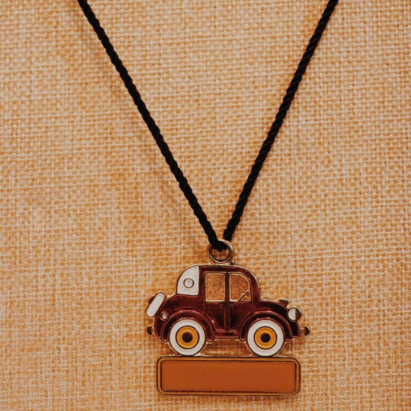 These adorable red car necklaces are on a 26 inch cord!