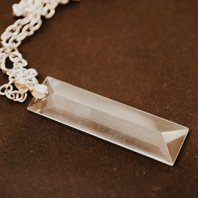 This necklace made with a vintage chandelier piece is on a 30 inch chain. It is perfect for layering!